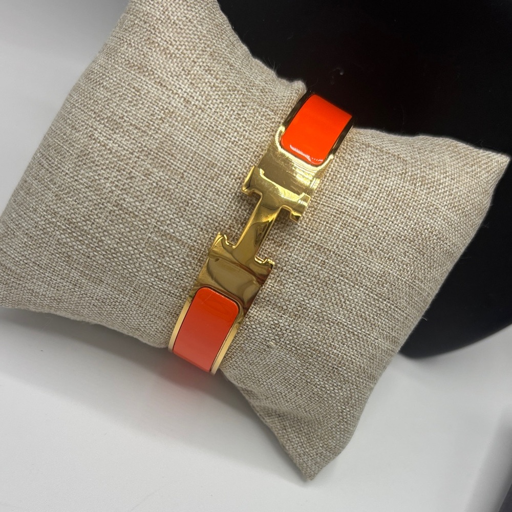 Gold Hinged Bangle Bracelet with Orange Enamel H Detail